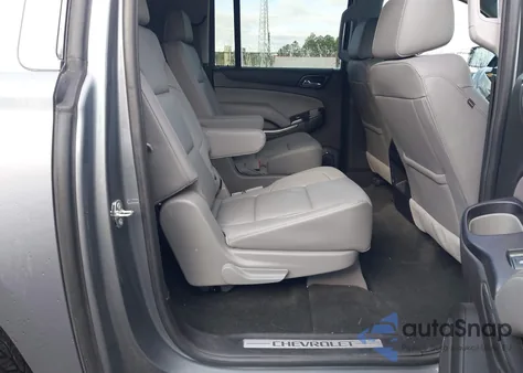 2018 Chevrolet Suburban Lt z USA, uszkodzony, nr VIN 1GNSCHKC1JR253757